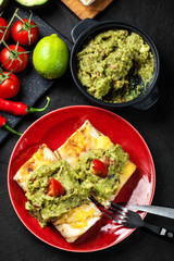 Mexican chimichanga with guacamole dip