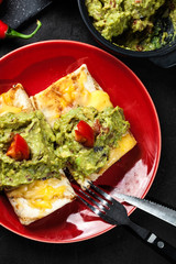 Mexican chimichanga with guacamole dip