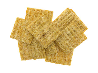 Whole grain crackers on a white background