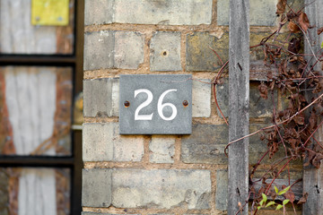 House number 26 sign