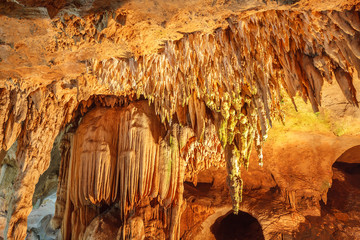 Stalactite rock formations in Lawa Cave. Kanchanaburi province, Thailand © phanthit malisuwan