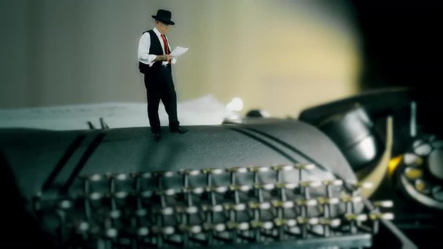 A tiny film noir style man standing and pacing on top of a vintage manual typewriter he used to write the story he is reading.