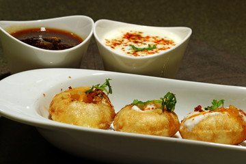 Panipuri or Gol Gappa or Chaat, Indian Street Food, Panipuri, Golgappe, Chat item, India, Stuffed Panipuri with aloo and Sweet Tamarind - Indian Food