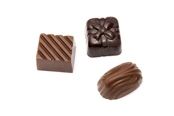 Chocolates closeup on white background