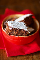 Glute free chocolate cake in a red bowl