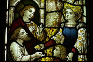 Fototapeta premium Feeding the poor (good deed) in stained glass