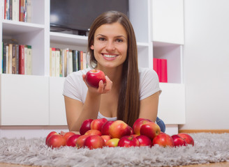 Obraz na płótnie Canvas Woman Eating Apples