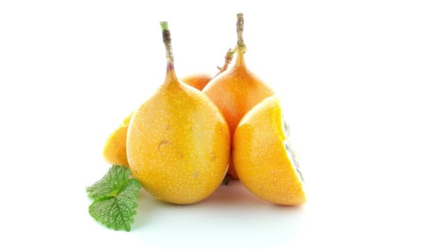 Passion fruit maracuja granadilla on white background.