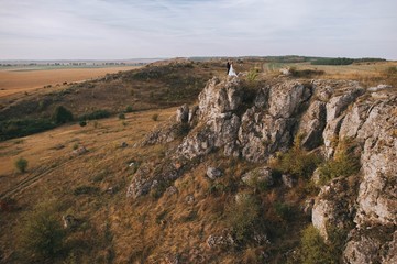 bride and groom on the mountain