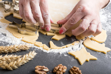 Cutting cookies from dough with cutters
