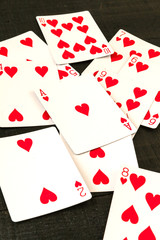 Image related to classic and online casino  games  on a game cards background from a player's perspective
