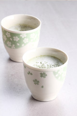 Cup of green tea latte.