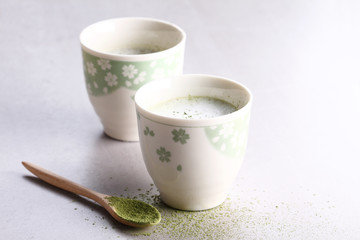 Cup of green tea latte.