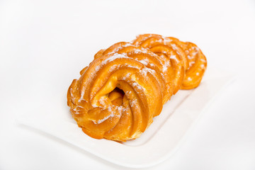 ring from custard paste with cream