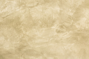 Wall concrete yellow gold texture background.