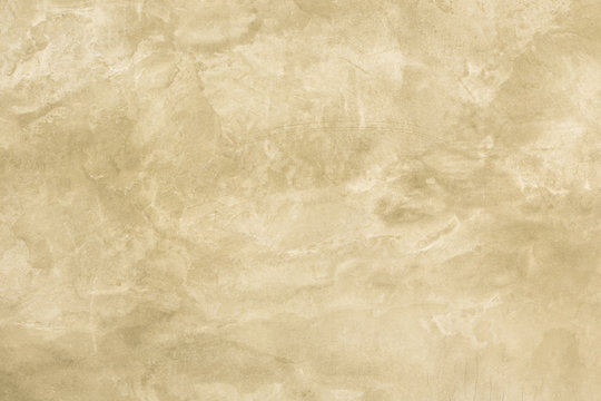 Wall Concrete Yellow Gold Texture Background.