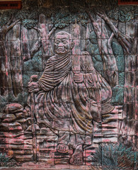 Naklejka premium Art of Buddhist monk on wall