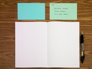 Greek; Learning New Language Writing Words on the Notebook