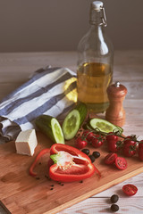 Ingredients for salad. Peppers, cherry tomatoes, olives, cucumbe