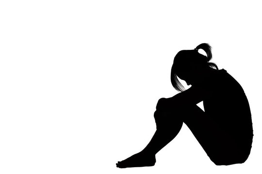 sad woman sitting silhouette