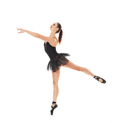 oung beautiful baliet dancer posing on a studio © matyuschenko