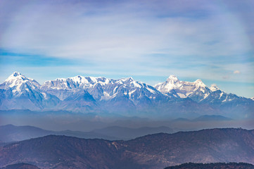 Snow on peaks of himalayan range - obrazy, fototapety, plakaty