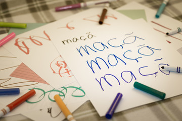 Portuguese; Kids Writing Name of the Fruits for Practice