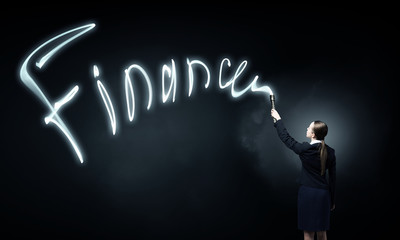 Woman drawing with lantern light