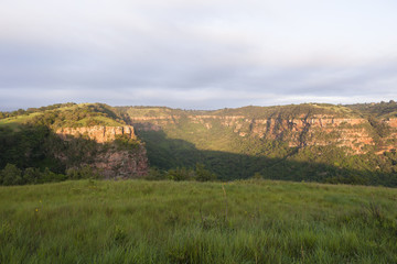 Fototapeta na wymiar Wilderness Landscape valley rocky cliffs gorge hiking exploring landscape of nature.
