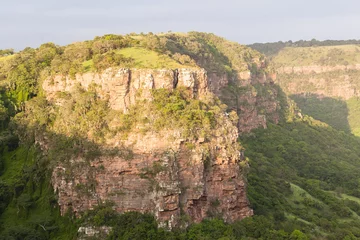 Foto op Canvas Wilderness Landscape valley rocky cliffs gorge hiking exploring landscape of nature. © ChrisVanLennepPhoto