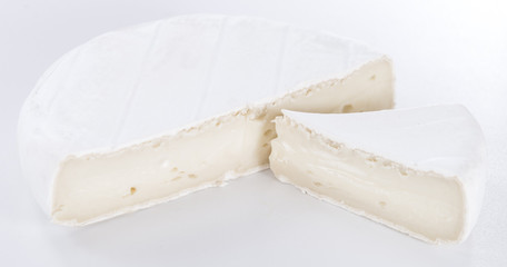 Camembert on grey background