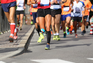 many runners during the marathon in town