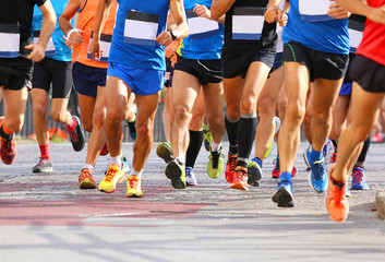 runners while running marathon in the city