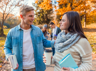 Students in autumn park