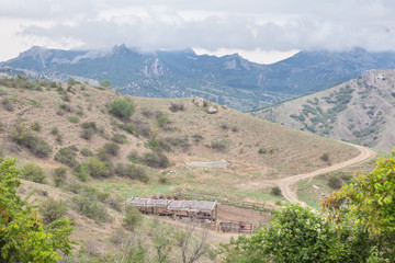 Naklejka premium stable in the mountains