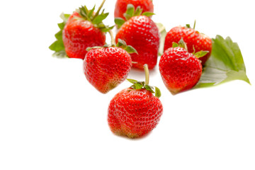 Fresh Strawberries with leaf isolated on white background, selec