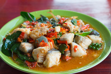fried spicy fish with herbs, thai foods hot spicy, soft focus