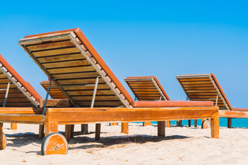 Umbrella pool and chair on the beach