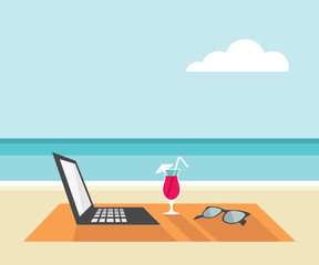 Obraz na płótnie Canvas Laptop, cocktail, sunglasses on the beach