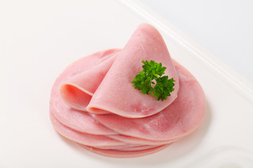 Fototapeta na wymiar Thin slices of ham