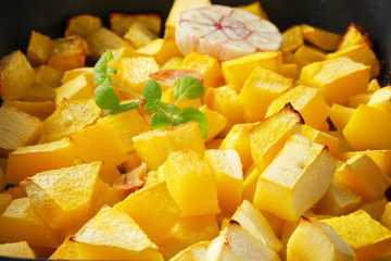 Diced pumpkin roasted with garlic