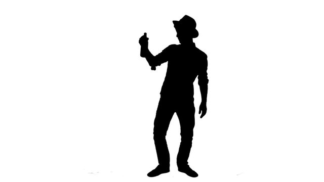 Drunk man silhouette cowboy style - 1080p. Silhouette of a drunk man silhouette cowboy style - 1080p