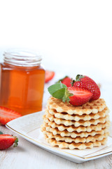 Jar of honey and waffles