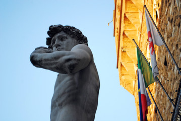Fototapeta premium FLORENCE, ITALY - NOVEMBER, 2015: David statue by Michelangelo in Signoria square, Palazzo Vecchio entrance