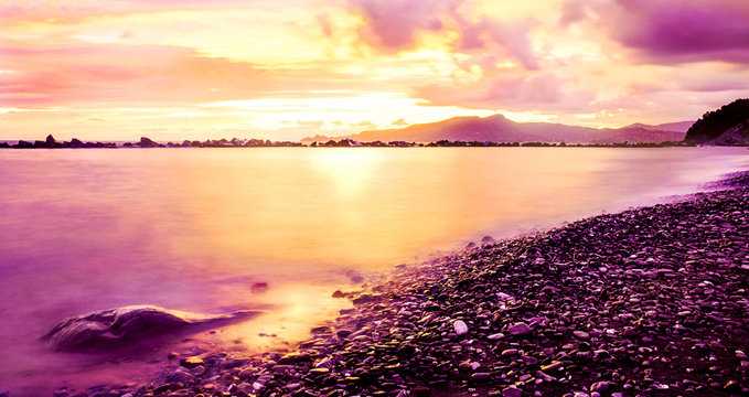 colorful sunset to the beach