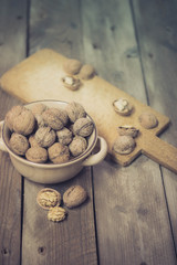 Walnuts on an old wooden table