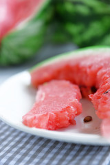 Sliced watermelon on plate closeup