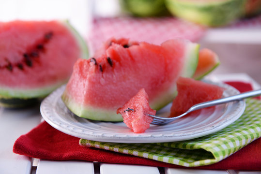 Sliced watermelon on plate closeup