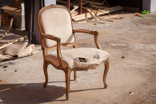 Vintage Worn Out Chair On The Street