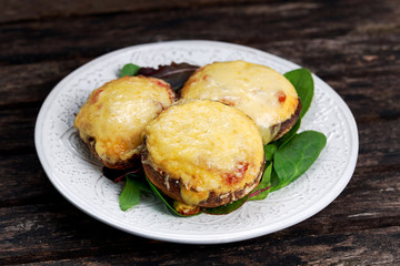 Cooked Mushrooms with vegetables and cheese
